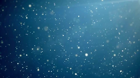 Magical falling snow particles on blue background loop Stock-Footage 336121327