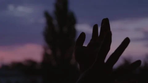 Magical hands movement sunset Stock Footage 135585926
