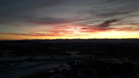 Magical Orange Red Sky Winter Sunset Pan to Intersection Stock Footage 321768811