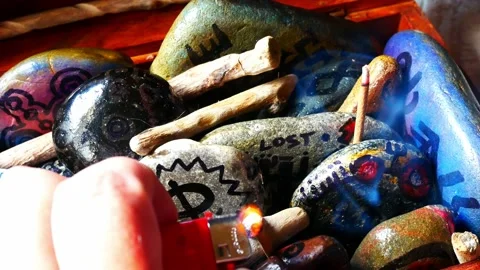 Magical painted Viking drawing patterned spiritual pebbles colourful hobby Stock Footage 158932315