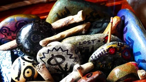 Magical painted Viking drawing patterned spiritual stones colourful art Stock Footage 158941353