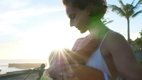 Magical process of breastfeeding. Young beautiful caucasian mother breastfeeds Stock Footage 158996499