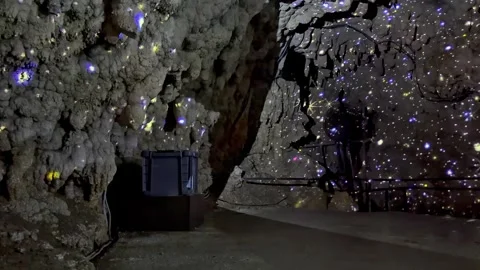 Magical Starry Light Display Inside a Japanese Cave Stock Footage 345371661