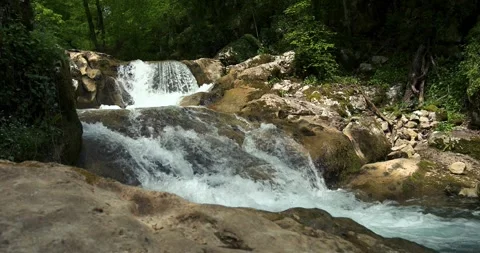 A magical stream with waterfalls and rapids Stock Footage 341832748