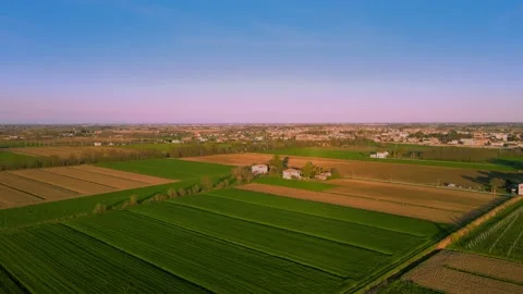 A magical sunset on the green fields, an extremely beautiful landscape Stock Footage 237517331