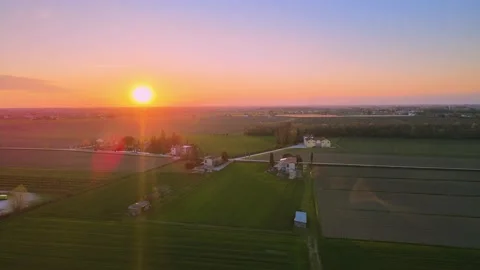 A magical sunset on the green fields, an extremely beautiful landscape Stock Footage 237518095