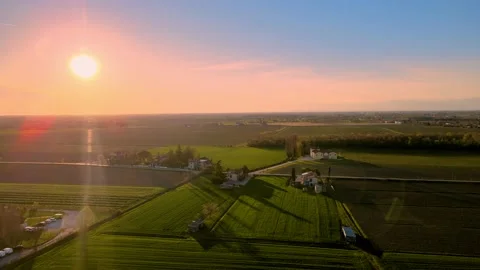 A magical sunset on the green fields, an extremely beautiful landscape Stock Footage 237518314