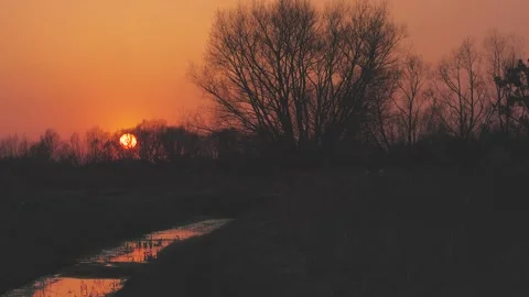 Magical sunset over a small river Stock Footage 150407593