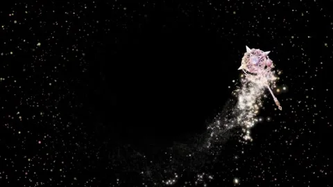 Magical wand casting glowing light particles in a dark starry space with a Video stock 338370527
