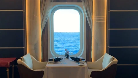 Magical window seat in fine dining restaurant on luxury cruise 库存影片 98528486
