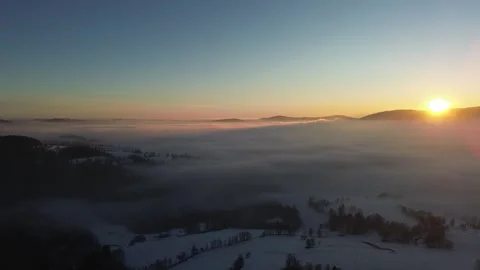 Magical Winter Sunset Over Misty Hills – Nature's Silent Beauty 5 Stock Footage 319446201