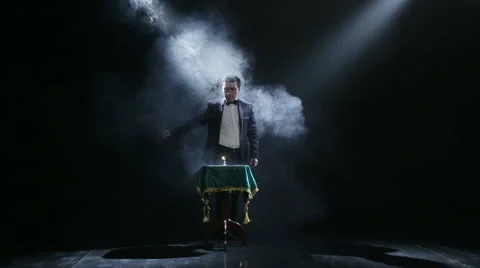 Magician and levitating table Stock Footage 54692480