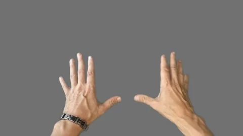 Magician esoteric conjures with arms move the space above the glass ball Stock Footage 282480452