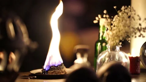 Magician touches fire at occult session Stock Footage