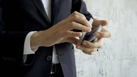 Magician's hands shuffling deck of cards, performing card trick. Slow motion. HD Video stock 96850398
