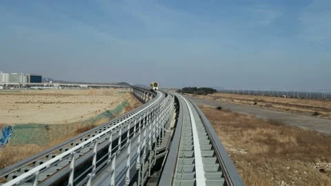 Maglev train on the railroad track Stock Footage 145970387
