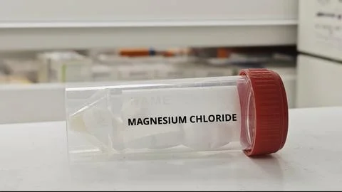 MAGNESIUM CHLORIDE tablets for support electrolyte balance and treat magnesiu 库存照片