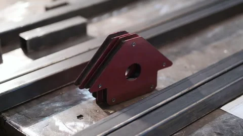 Magnet for welding and restoring the exact angle Stock Footage 259307014