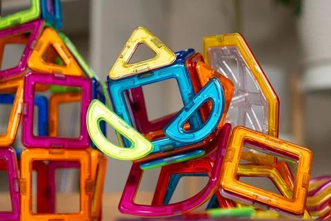 Magnetic constructor buildings on the table. Educational toys Stock Photos