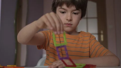 Magnetic Force Demonstration Showing Attraction. Boy Playing With Magnetic .. Stock Footage 283531319