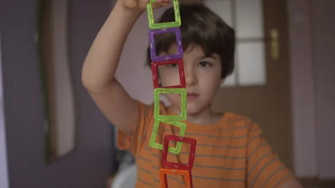 Magnetic Force Demonstration Showing Attraction. Boy Playing With Magnetic .. Stock-Footage 312011256