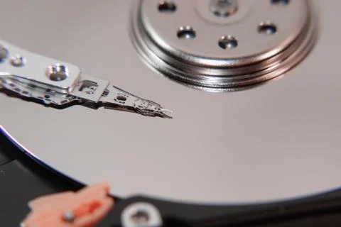 Magnetic head of the hard disk. Inside hard drive Stock Photos