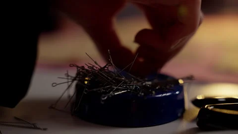 Magnetic Pin Holder with Assorted Sewing Pins in Tailoring Workshop Stock Footage 264352097