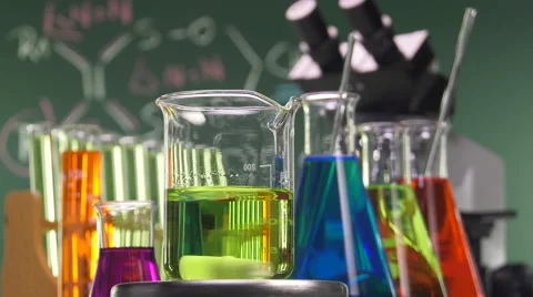 Magnetic stirrer at work with yellow liquid beaker Video stock 64287809