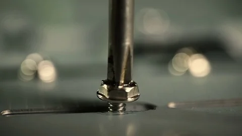 Magnetic tip of the screwdriver that inserts and screws a screw Video stock 77766277