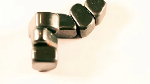 Magnets Sticking Together Stock Footage 71552215