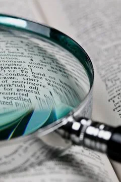 Magnifer and dictionary Foto stock
