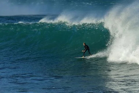 Magnificent action on a mighty wave Stock Photos