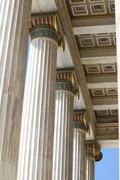 Magnificent columns of Ionic style, and elements of neoclassical architecture Stock Photos