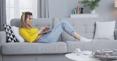 Magnificent female worker using a computer. The girl develops a strategy for Video stock 129933237