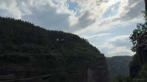 Magnificent Mountain Cliffs and Historic Pavilion at Jianmen Pass, Sichuan, Видео 337092040