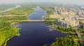 Magnificent panorama of large city, river and buildings aerial HD Footage