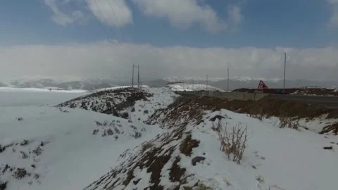 A magnificent range of snow capped peaks extends across, stock footage. Stock Footage 304867108