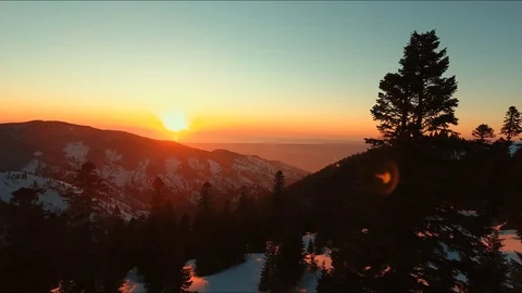 Magnificent sunset over the clouds on beautiful Gomi mountain Stock Footage 127828358