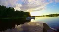 Magnificent sunset on peaceful river, tourists in boat, nature HD Footage