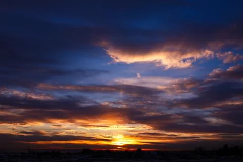 Magnificent sunset with red clouds Stock Photos