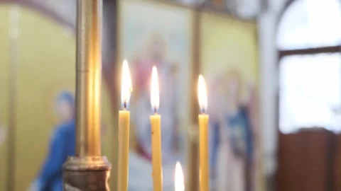 A magnificent view of the burning candles inside the church Stock Footage 270417800