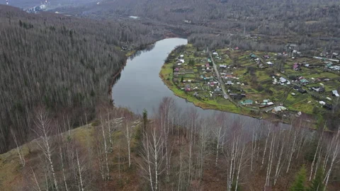 A magnificent view from the cliff opens to the river Stock Footage 141784540