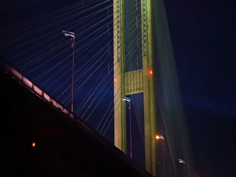 Magnificent view of the glowing night bridge, a bottom point Stock Footage 71862333