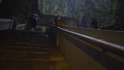 Magnificent view of monkey playing in steps leading to batu caves, kuala lumpur Stock Footage 111279632