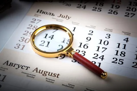 Magnifier on the diary Stock-Fotos