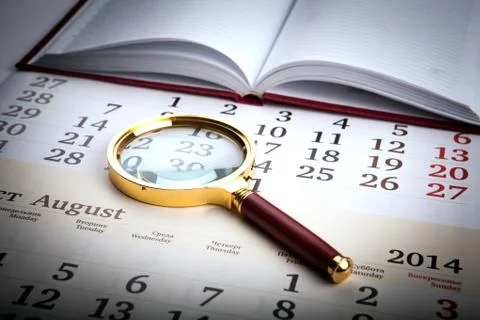 Magnifier on the diary Stock Photos