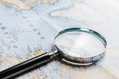 Magnifier on map Stock Photos