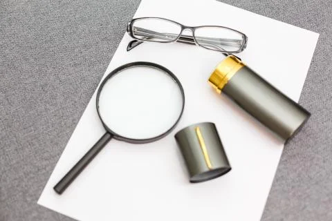Magnifier,glasses and notebook Foto stock