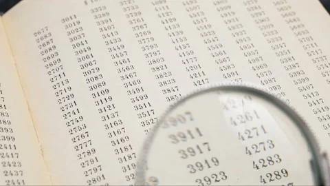 Magnifying glass and document with figures, data encrypt with magnifying glas Stock Footage 149693425