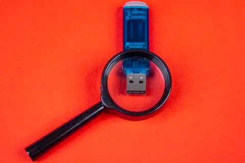 Magnifying glass data stick - data security and verification Stock Photos